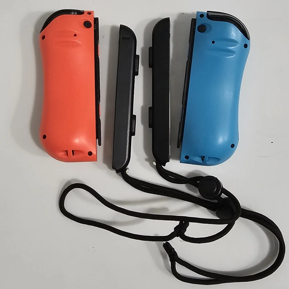 OEM Official Nintendo Switch Joy-Con Controller Pair (L/R)- Red/Blue Set